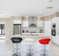 Central Gold Coast Large Modern Elevated Home - Northern Rivers Accommodation