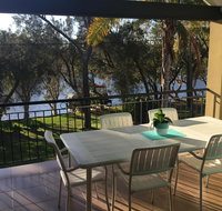 Reflections on the Murray river near Mandurah - Northern Rivers Accommodation