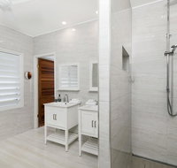 Bathers across the bay from Port Douglas - Northern Rivers Accommodation