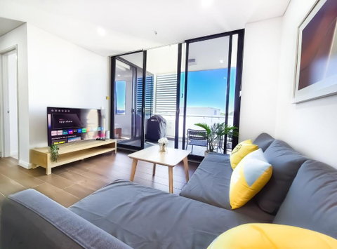 Relaxing 1BR W Pools & SPA, Gym In Olympic Park - Northern Rivers Accommodation 3